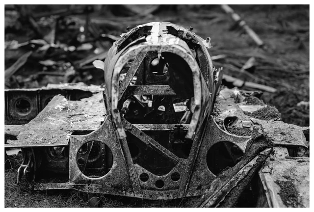 The exposed fuselage frame of the German Dornier Do-17 that crashed at Hansakollen in 1942, its skeletal metal ribs lying among forest wreckage in Maridalen.